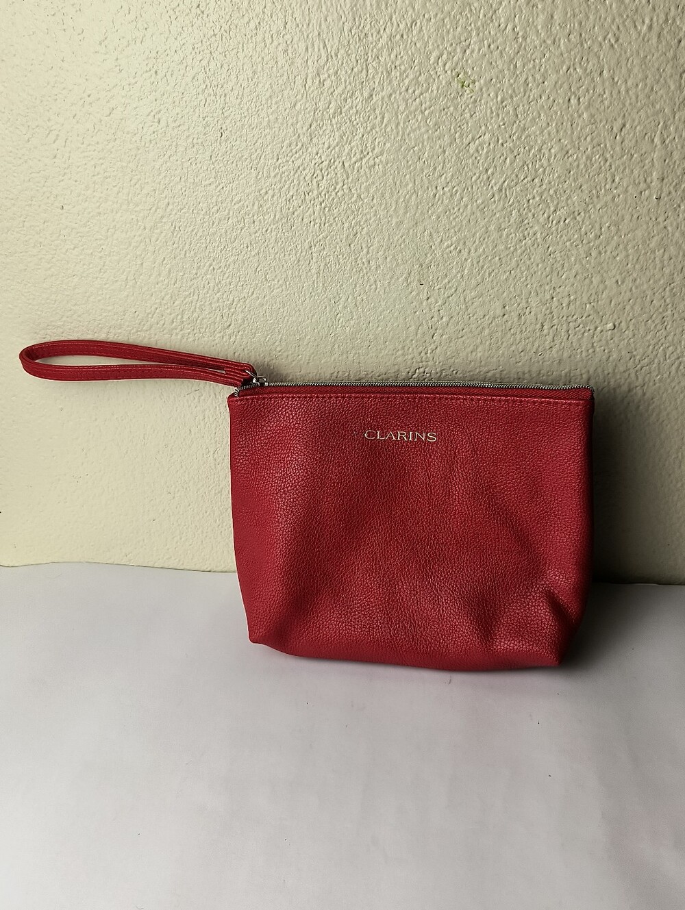 Clarins Red Wrist Bag